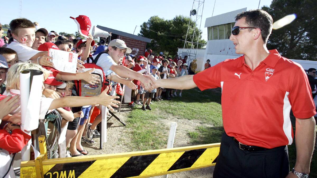 Leo Barry greets fans during Sydney Swans Premiership Cup tour at Wagga's Maher Oval. File picture