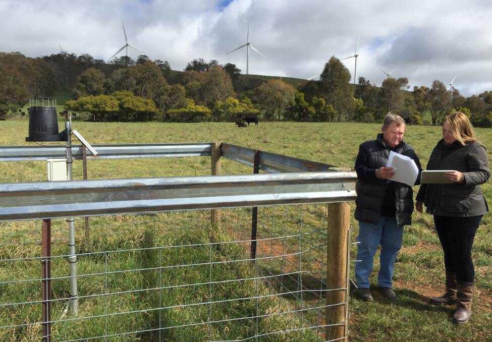 INSIGHT: Bannister grazier John Klem discusses soil moisture results with executive officer for Tablelands Farming Systems, Tracy Watson. Photo: Bronwyn Haynes. 