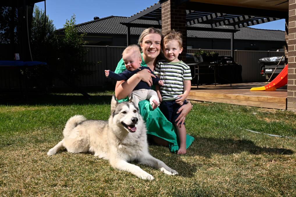 Caitlin Walker with dog Nala and kids Aston and Oakley. Picture by Adam Trafford