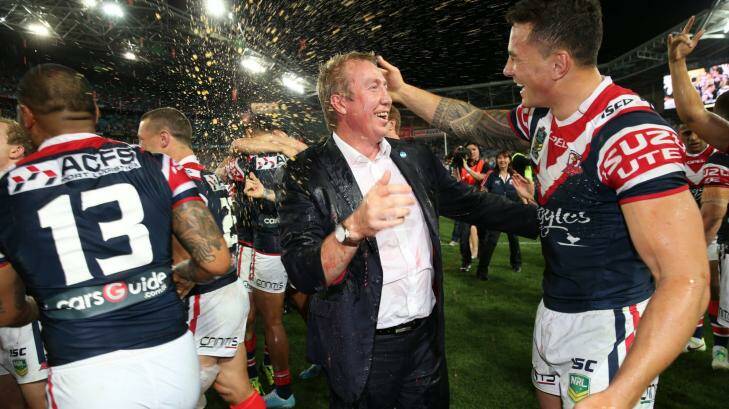 Grand old time: Roosters coach Trent Robinson and Sonny Bill Williams celebrate last year's premiership win over Manly.  Photo: Brendan Esposito