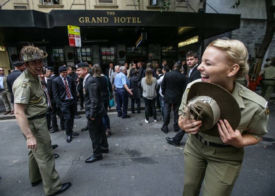 ANZAC DAY SYDNEY 2015 SMH NEWS
PTE Elizabeth Smith of the 1/15 Royal NSW Lancer Band enjoys a light moment prior to the Anzac Day march in Sydney. 25th April 2015
Photograph Dallas Kilponen Photo: Dallas Kilponen