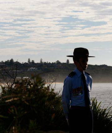  A Catafalque Party Mount member stands guard during the Anzac Service at Freshwater. Photo: Daniel Munoz