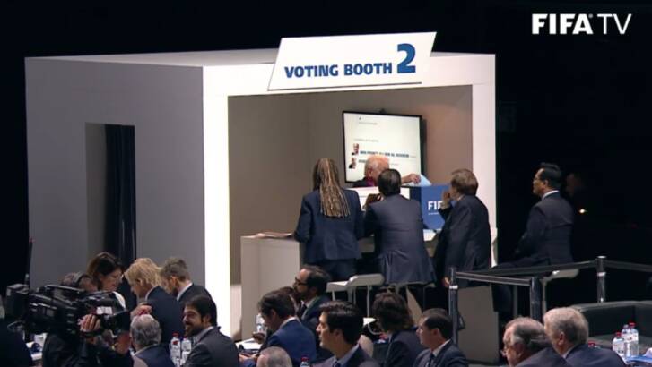 Lowy casts his vote in the voting booth. Photo: Courtesy FIFA TV