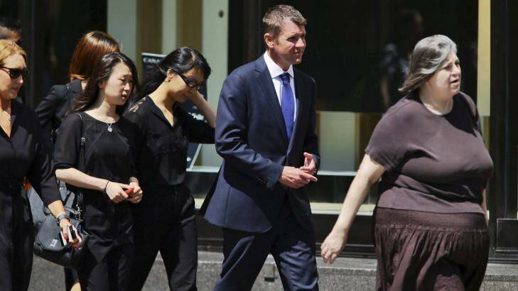 Premier Mike Baird joined friends and family at siege victim Tori Johnson's memorial service. Photo: Wolter Peeters