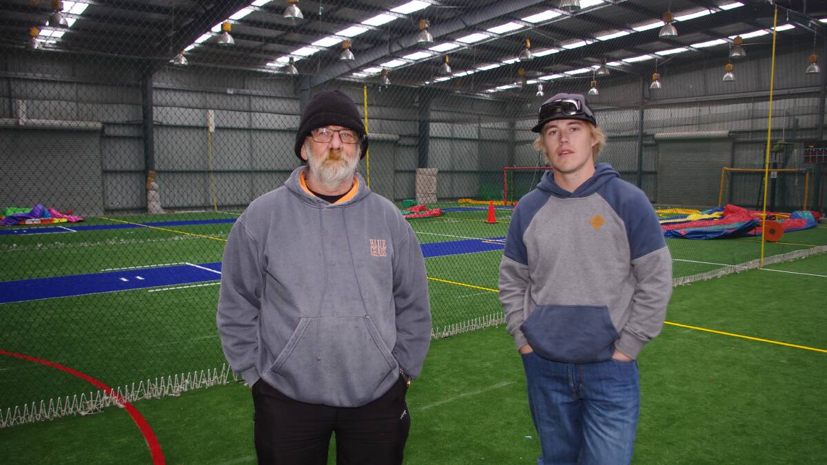 UNECONOMIC: Garry Mortimer has closed Tully Park Indoor Sports Centre . He stands with Sam Chamber, who helped organise teams of sportspeople to pack up and store the facility's equipment. Photo: Darryl Fernance

