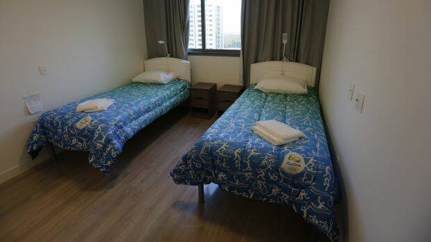 Beds stand ready in the bedroom of an apartment of the Olympic Village in Rio.  Photo: Leo Correa