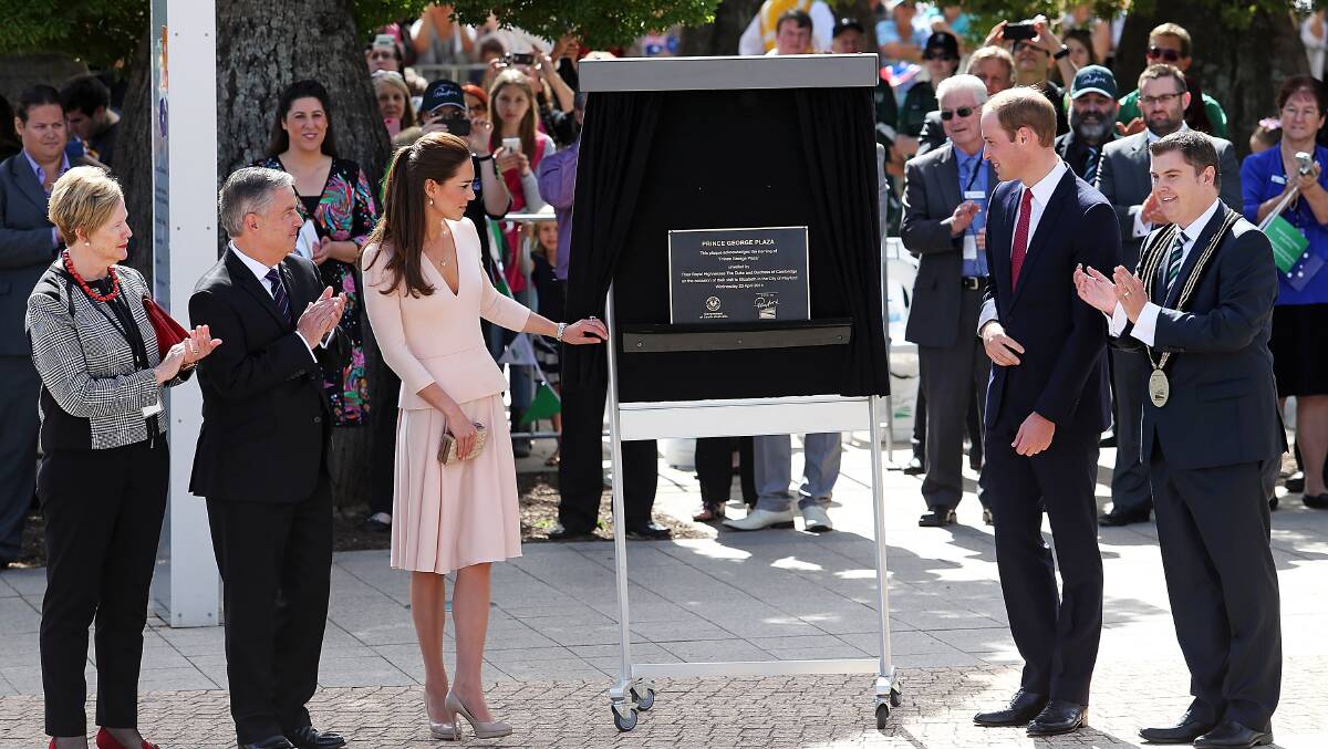 Catherine, Duchess of Cambridge and Prince William, Duke of Cambridge unveil a plaque to commemorate the naming of 'Prince George Plaza'. Photo: Getty Images