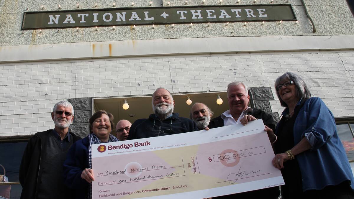 Dave Nelson, Helen Small, Scott Hart, Richard Elliott, Gary Hovey, Nick Fry and Mary Mathais at the cheque presentation on Monday.
  