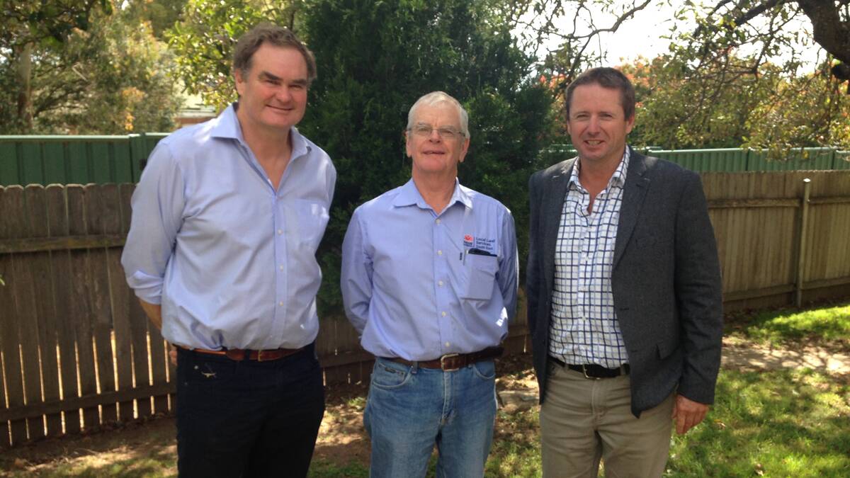 Chair of Local Land Services Board of Chairs, John Macarthur-Stanham (left) and South East Local Land Services Chair, David Mitchell (right) congratulate District Veterinarian, Bob Templeton (centre) on his career following the announcement of his retirement from South East Local Land Services.  