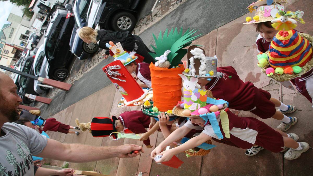The Easter Hat Parade passes The Albion.