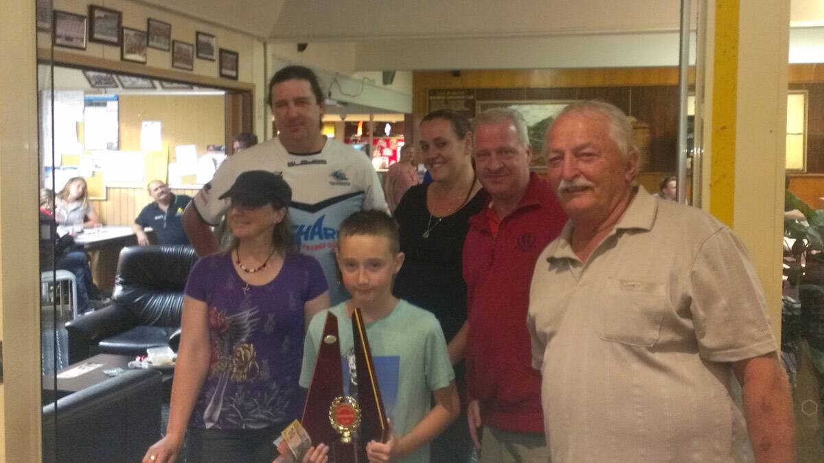 Winners are grinners at the Barefoot Bowls: The Leroys with Nick Fry and Phil Lewis.  