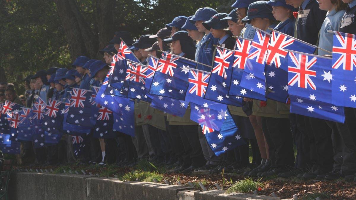 The 88 primary school children representing Braidwood’s fallen WW1 soldiers, carrying a satchel with a booklet on their life, then planted an Australian flag along Ryrie Park in their memory.


