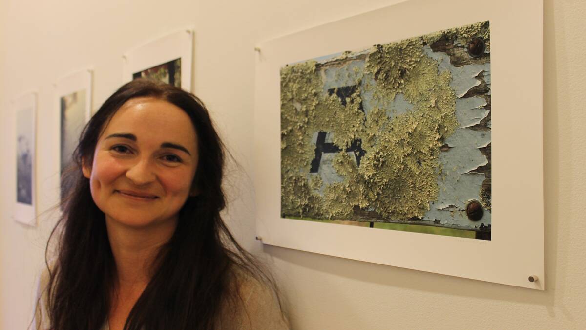 Nadia McGleish with one of her detailed photographs.
