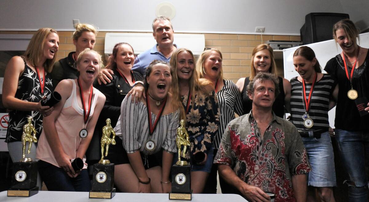 BLACK WIDOWS: The team celebrates their first season of play on Friday night, with a presentation evening for members. Photo: Elspeth Kernebone