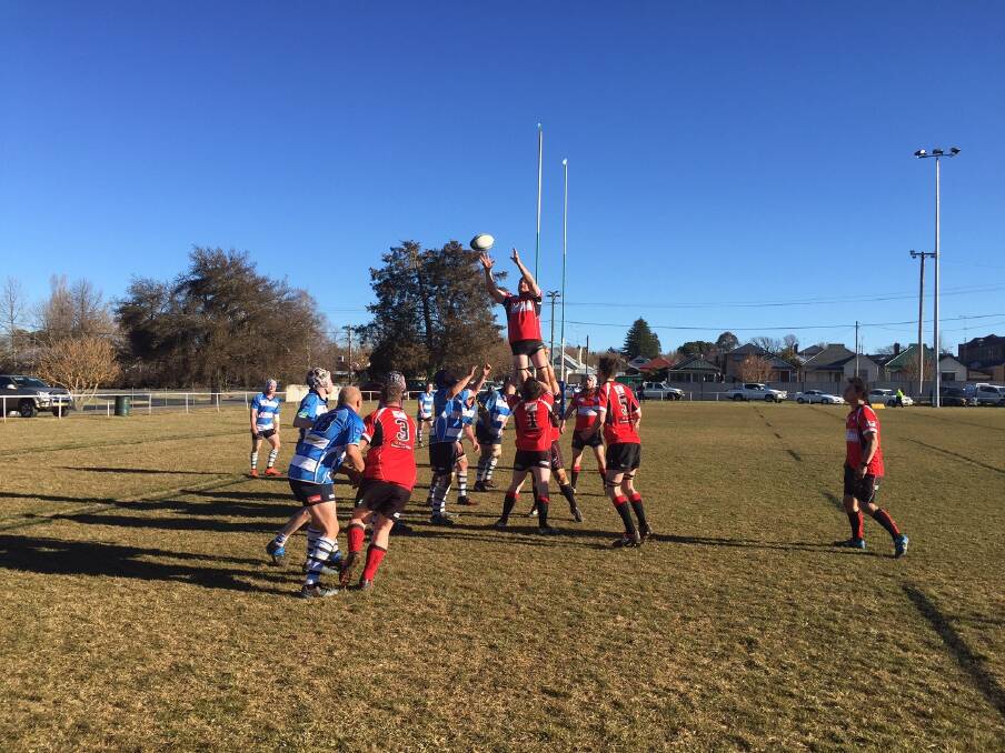 HIGH FLYER: Tim Moffitt scaling high in the lineout in Crookwell on Saturday. Photo: supplied.