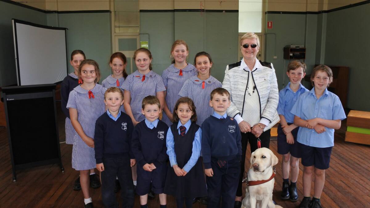 Kids at St Bede's Primary School met Mr Darcy the guide dog and owner Elaine Heskett from Guide Dogs NSW/ACT.