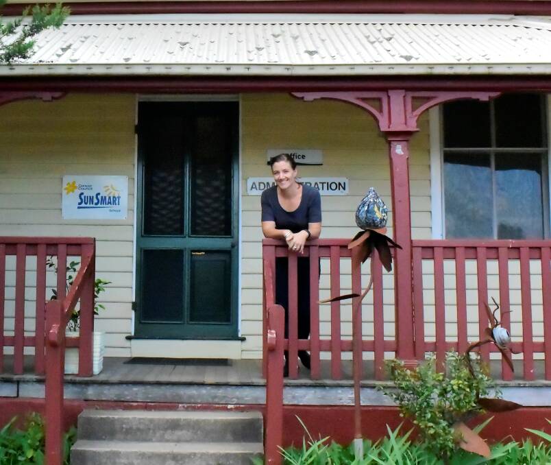 MEMORY LANE: Irene Singleton out the front of Braidwood Central School where she completed her schooling from Kinder to Year 12. Photo: Elspeth Kernebone