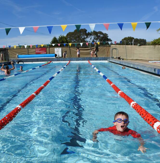 NEARLY THERE: A one-lap swimmer finishes his race at swim club. One-lap swimmers swim between 4.50-5pm; multiple lap swimmers, 5-6pm. Photo: Elspeth Kernebone
