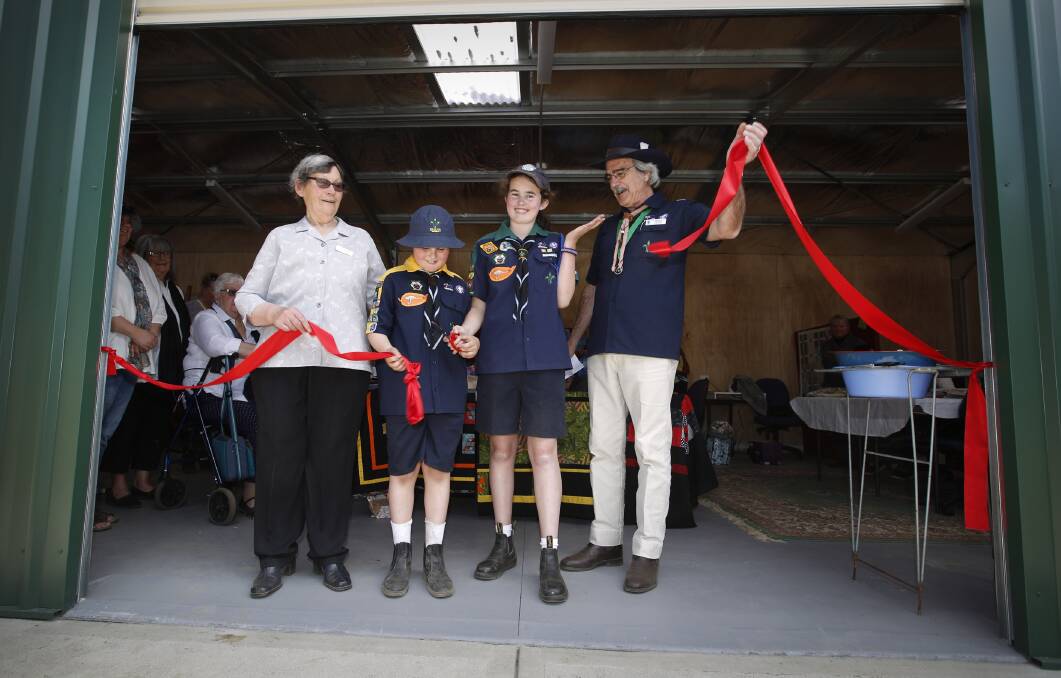 HURRAH: Lesley Horn, Henry Campbell, Charlie Campbell and Laurie Joyce open Braidwood Quilters Inc's new facility. Photo: Tim Wimborne.