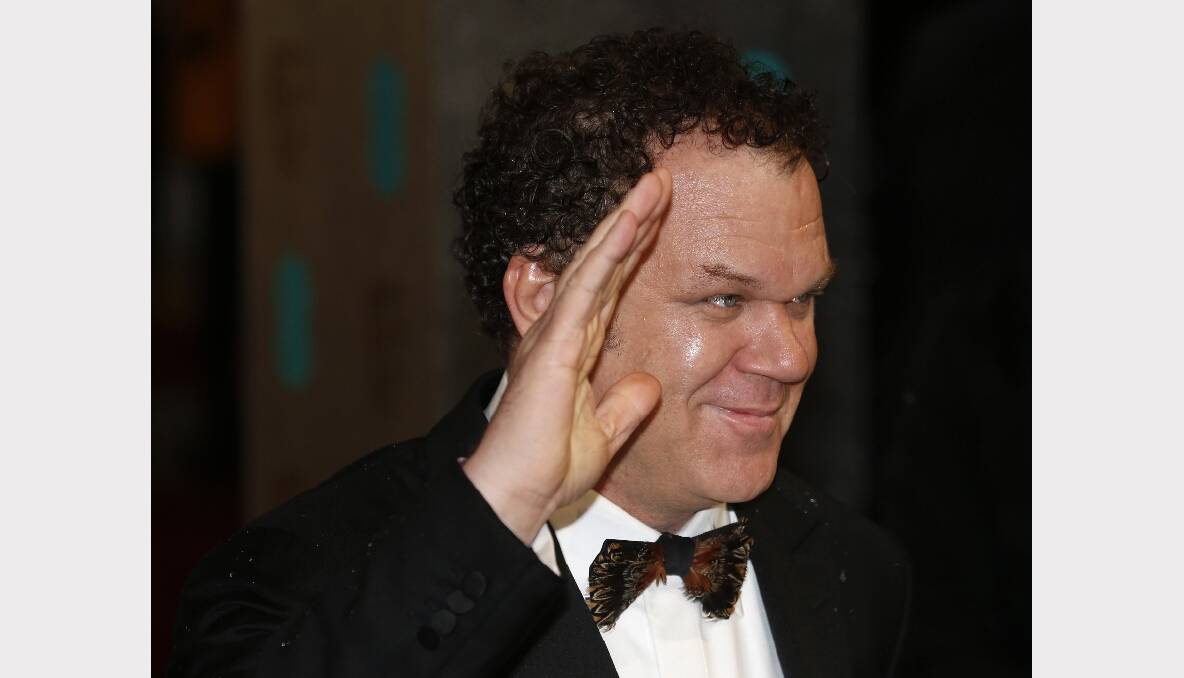 John C. Reilly poses as he arrives for the British Academy of Film and Arts awards. Photos: GETTY IMAGES, REUTERS