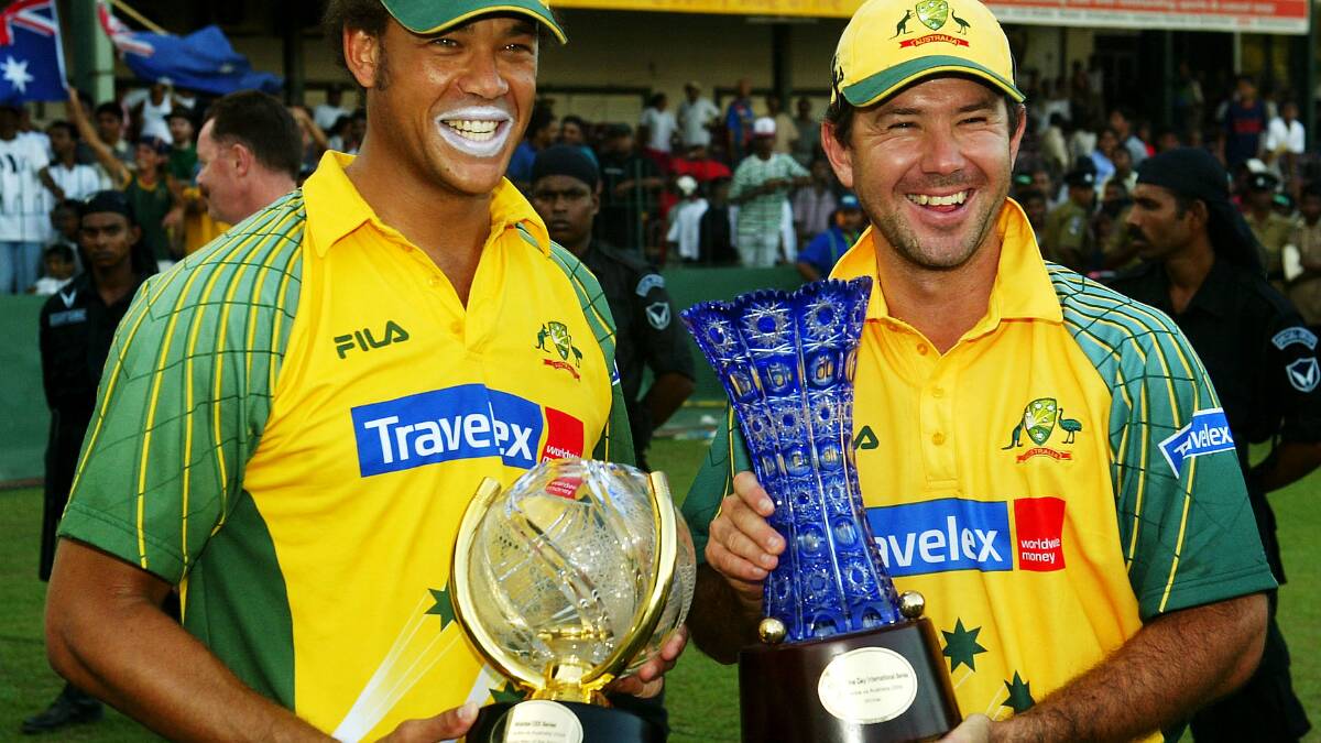 Andrew Symonds and Ricky Ponting with the Player of the Series trophy and the Tournament Trophy after the One Day International between Sri Lanka and Australia played at Singhalese Sports Club on February 29, 2004. Photo: GETTY IMAGES