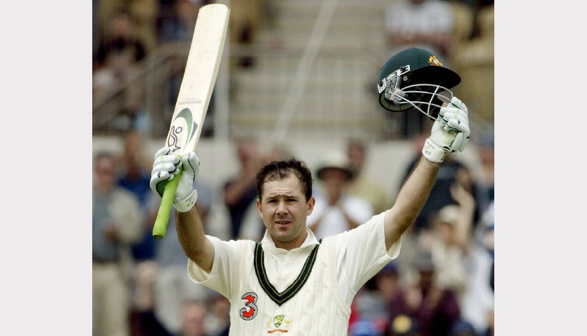 Ricky Ponting celebrates reaching his century during the first day of the second test against India at the Adelaide Oval December 12, 2003. Photo: REUTERS