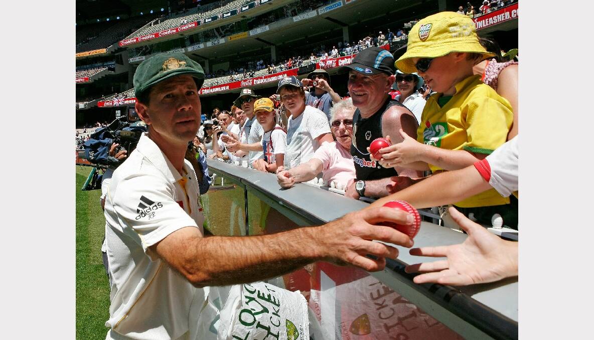 Ricky Ponting hands out cricket balls to members of the crowd after day four of the Fourth Test match between Australia and England at Melbourne Cricket Ground on December 29, 2010. Photo: GETTY IMAGES