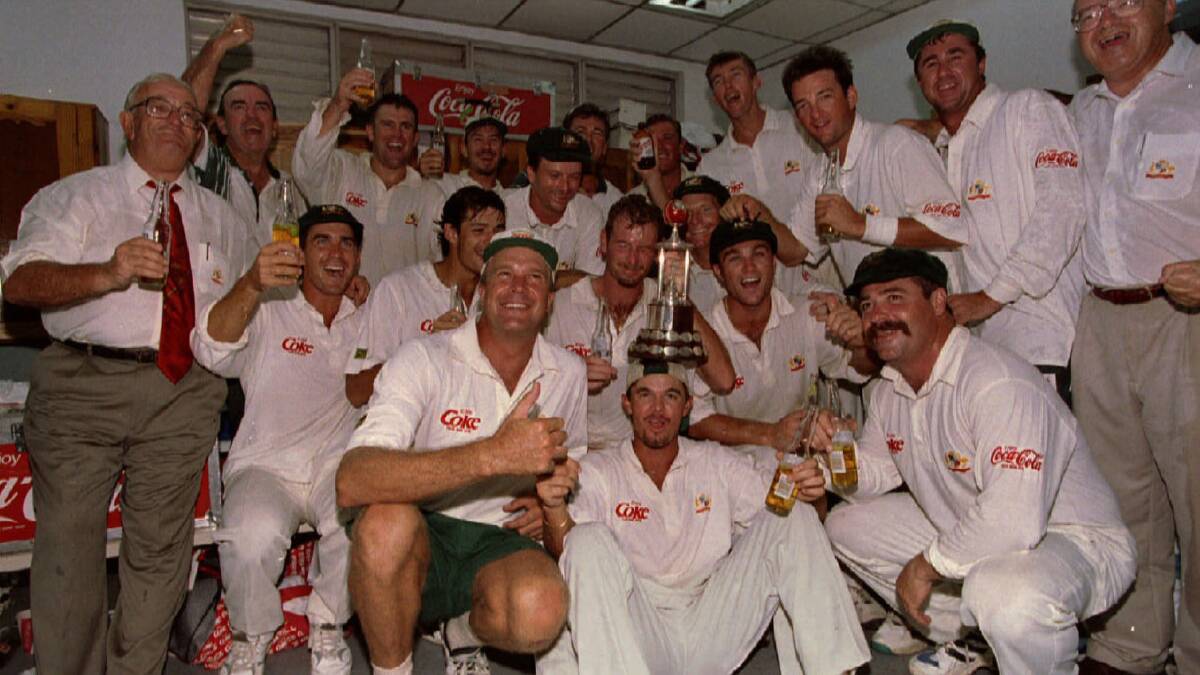 The Australian cricket team celebrate in their dressing room following their victory over the West Indies in the 1995 test series. Photo: REUTERS