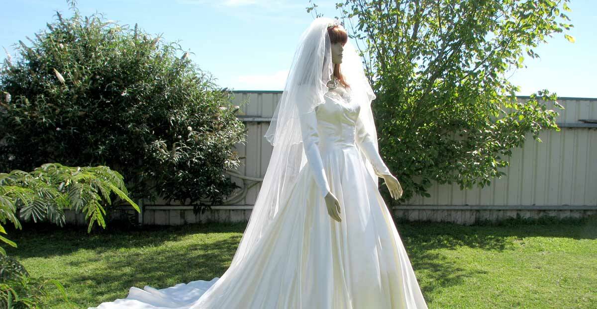 1940s Wedding Dress from the USA made from 10 metres of heavy cream slipper satin". 