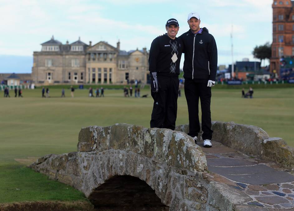 Oscar Pistorius and Paul McGinley pose for a photo on the Swilken Bridge on the 18th hole during the third round of The Alfred Dunhill Links Championship. Photo by David Cannon/Getty Images