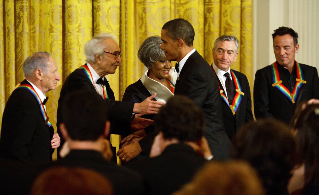 Recipient of the 2009 Kennedy Center Honors Dave Brubeck is greeted by U.S. President Barack Obama at the White House. Photo by Martin H. Simon-Pool/Getty Images