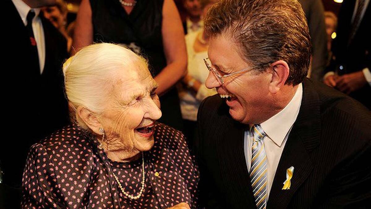 Dame Elisabeth Murdoch has a laugh with Victorian Premier Ted Baillieu at her 102nd birthday celebrations at the Melbourne Recital Centre. Photo: Justin McManus