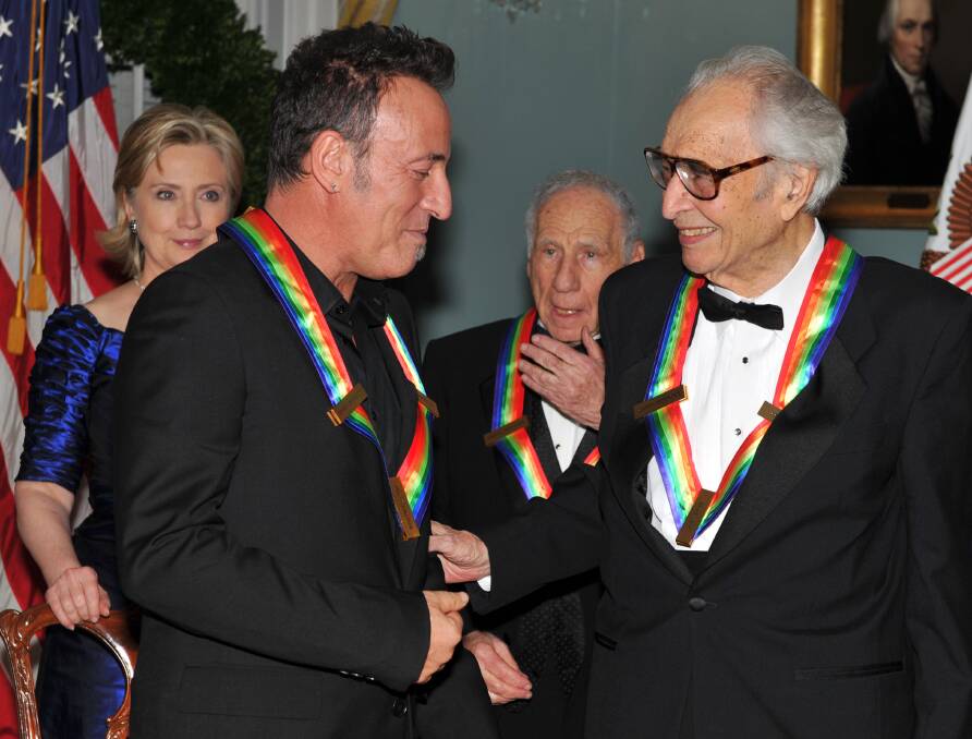 Kennedy Center honorees Bruce Springsteen and Dave Brubeck engage in conversation at the United States Department of State on December 5, 2009 in Washington, D.C. Photo by Ron Sachs-Pool/Getty Images