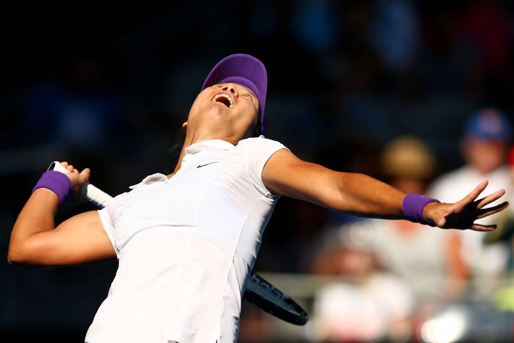 Na Li serves in her fourth round match against Julia Goerges. Photo by Ryan Pierse/Getty Images