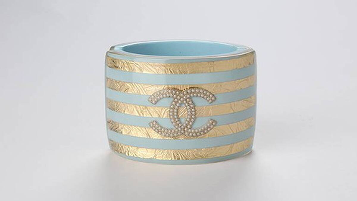 Chanel Golden and blue resin bracelet, $1400, 1300 242 635.