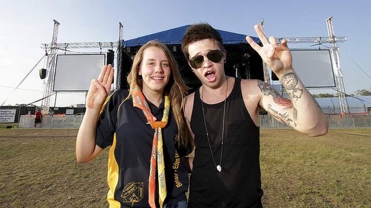Olivia Hallam, 13, from Eden Hills, SA, meets Reece Mastin who performed at the Jamboree. Photo: Michelle Smith