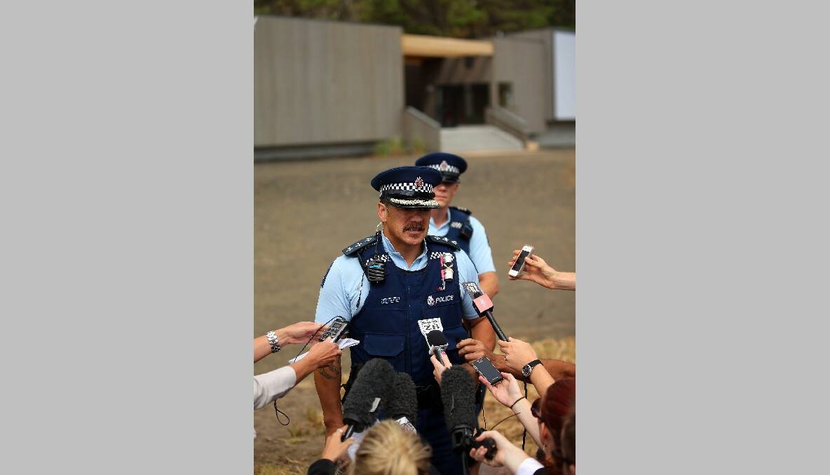 Police Inspector Shawn Rutene speaks to media outside the Muriwai Surf Lifesaving Club after a swimmer died in a fatal shark attack at Muriwai Beach on February 27, 2013 in Auckland, New Zealand. Photo by Phil Walter/Getty Images