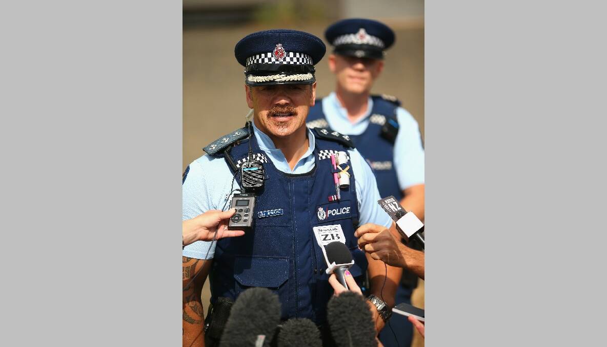 Police Inspector Shawn Rutene speaks to media outside the Muriwai Surf Lifesaving Club after a swimmer died in a fatal shark attack at Muriwai Beach on February 27, 2013 in Auckland, New Zealand. Photo by Phil Walter/Getty Images