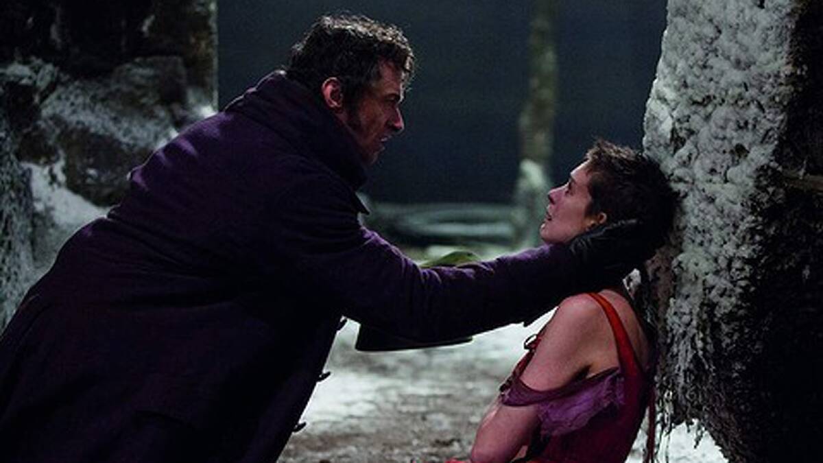 <b>Anne Hathaway as Fantine and Hugh Jackman as Jean Valjean in Les Miserables.</b>