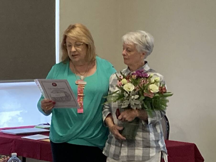 United Hospitals Auxiliary president Tracy Wilkinson presenting State Life Membership to Jan Carpenter of Cooma. Photo: Supplied.