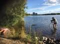 Chris Chacos (cinematographer) filming at Lake Ginninderra - actress Amelie Wertenauer. Photo: Supplied.