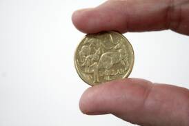 $1 coin featuring five kangaroos designed and sculpted by artist Stuart Devlin. File picture