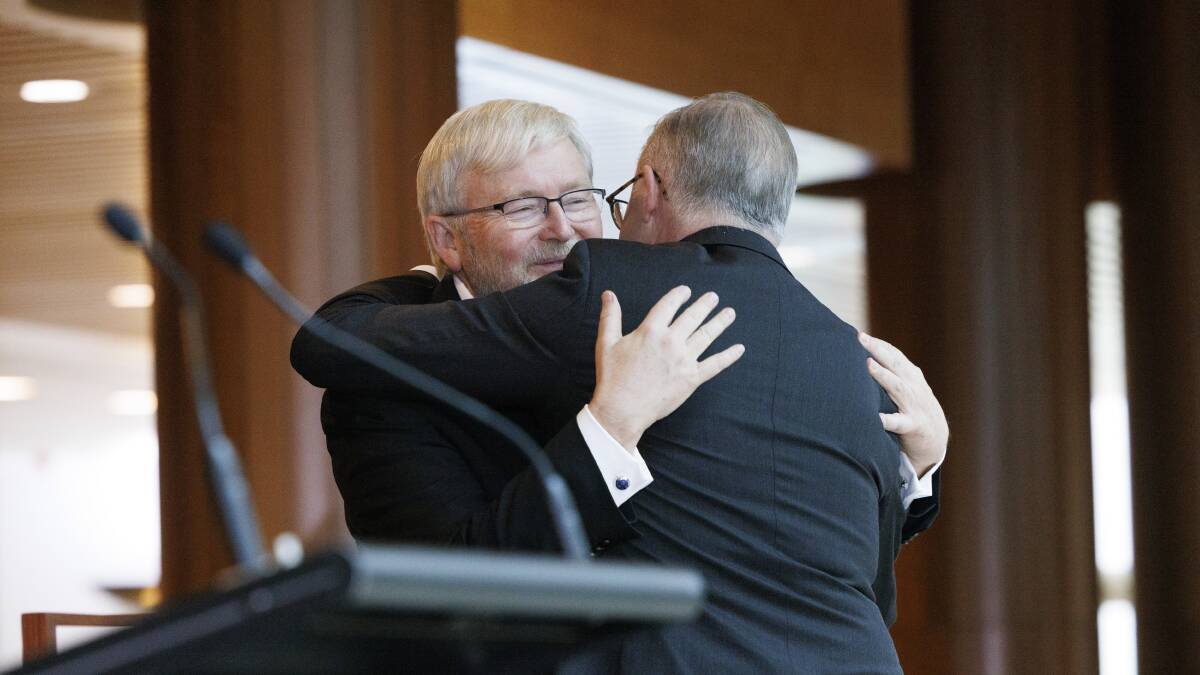 Kevin 07 and Albo, aka prime ministers No. 26 and No. 31, embrace at the portrait unveiling. Picture by Keegan Carroll