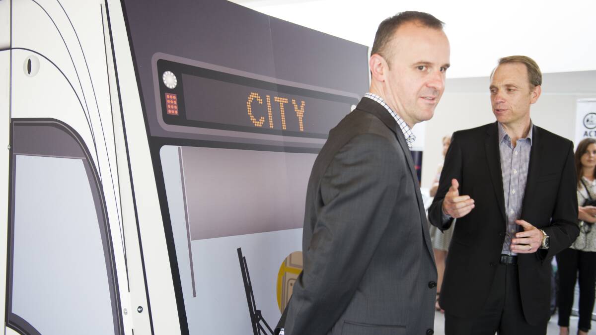 Chief Minister Andrew Barr, left, and then Capital Metro minister Simon Corbell in 2015 at a launch of consultation on light rail designs for Canberra. Picture by Jay Cronan
