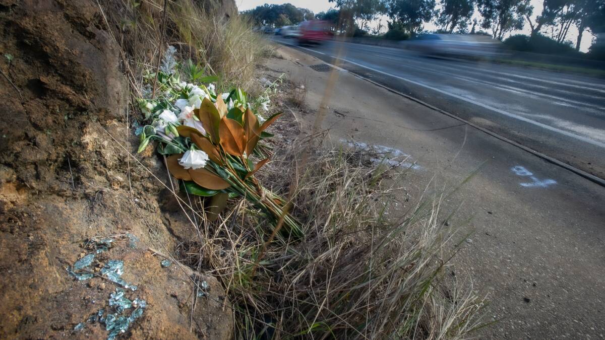 White flowers and a handwritten card make a roadside memorial on Hindmarsh Drive for Matthew McLuckie. Picture: Karleen Minney