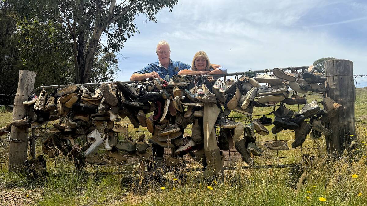 Mark and Annette Watson at the Bobeyan Boot Gate earlier this week. Picture by Tim the Yowie Man