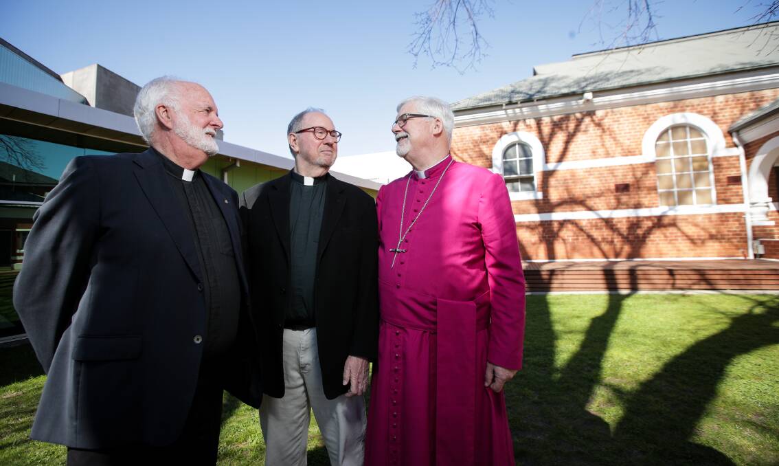 FIGHTING FOR CHANGE: Wangaratta couple John Davis and Rob Whalley still hope to be the first same-sex couple blessed by the Anglican Church and have been supported by retired Bishop John Parkes.