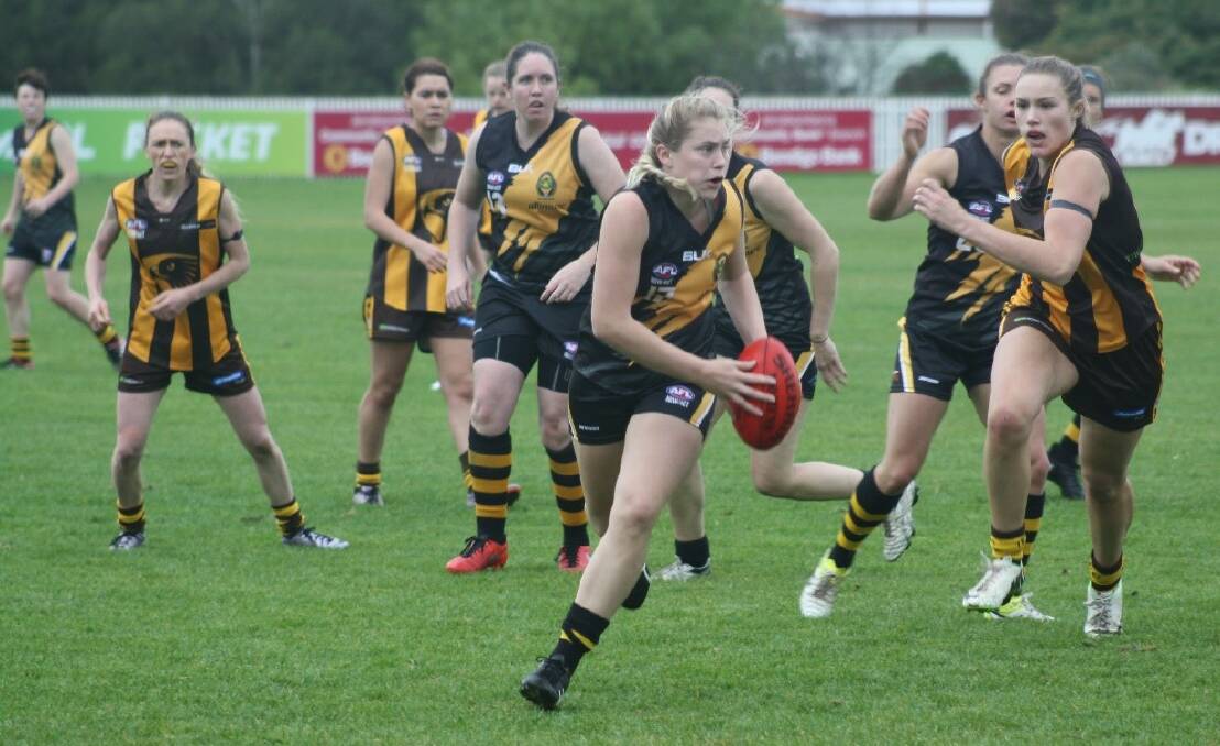 AFL ACTION: Tigerette Katie Reid from Goulburn in action last season. Training is at Allinsure Park, Queenbar Road, Queanbeyan (opposite the Tigers Club) Photo: Supplied

