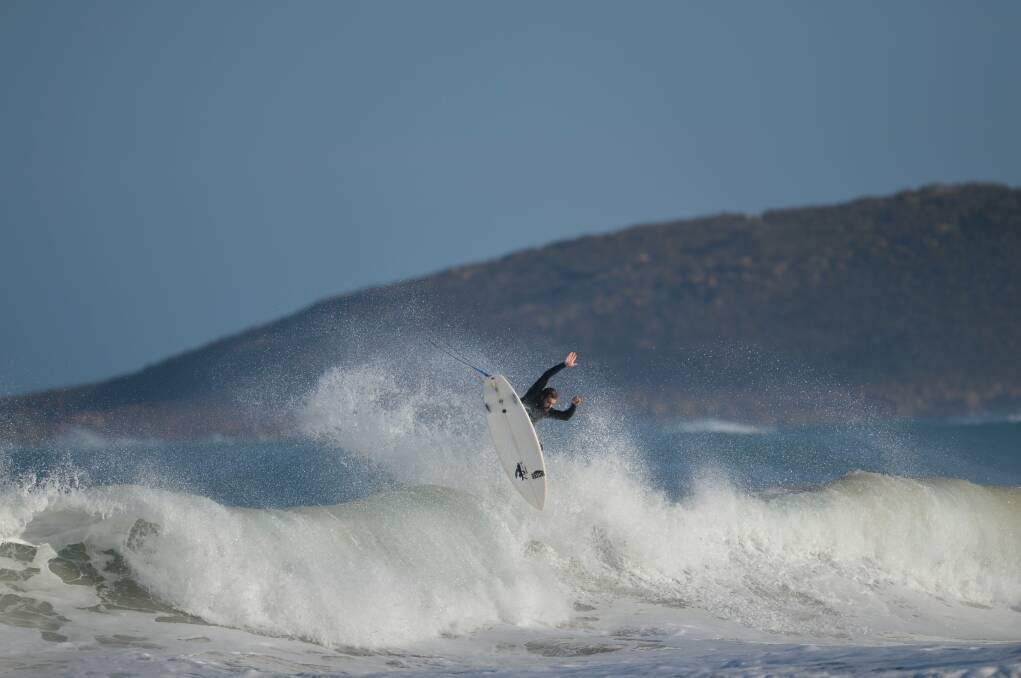 Heath Joske gets some air during a surfing session, away from the dust and straw of his property. Picture by SA Rips
