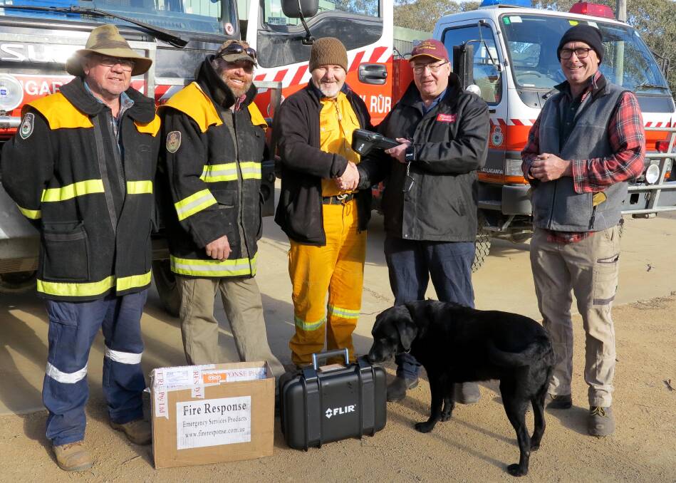 Tom Blacka, Paul Bott, William Verdon, Scott Hart and Tim Girling, with Jack White the labrador and the new thermal imaging camera.